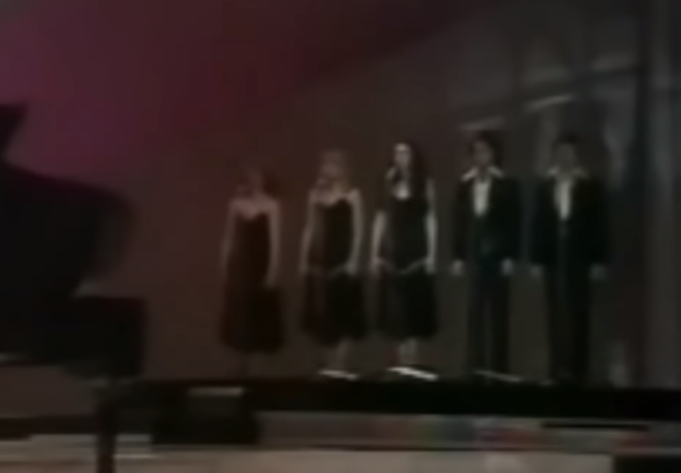 Three female and two male backing singers